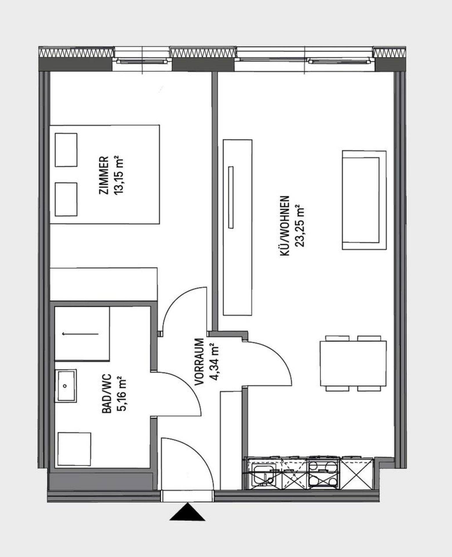 Grundriss einer Wohnung mit einem Schlafzimmer, Bad und offenem Wohn-/Kochbereich sowie Balkon.