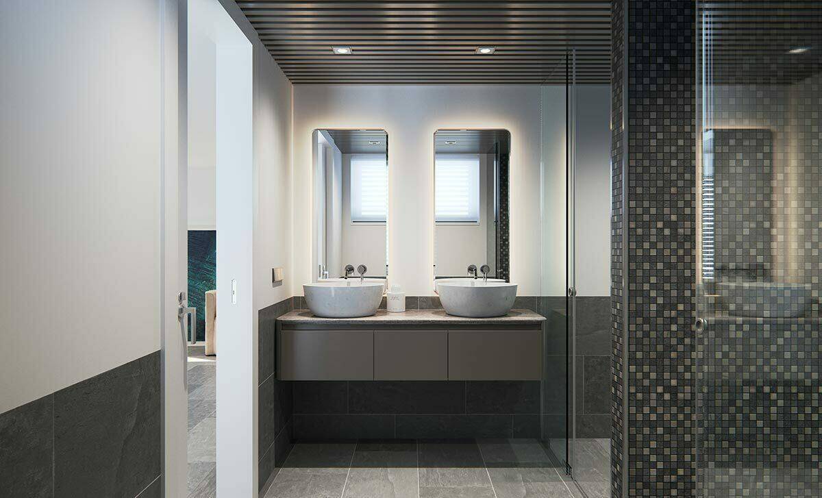 Modernes Badezimmer mit Doppelwaschbecken, begehbarer Dusche und stilvollen Fliesen.