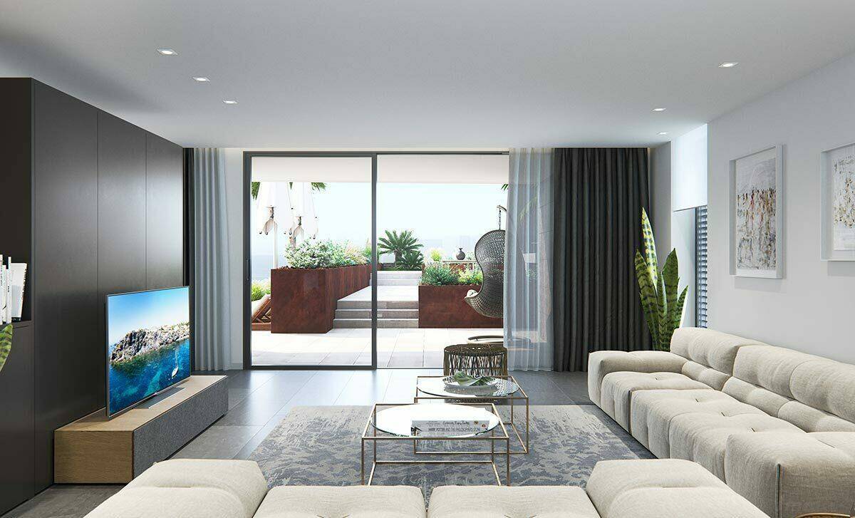 Modernes Wohnzimmer mit großen Glasfronten, Meerblick und Zugang zur Terrasse.