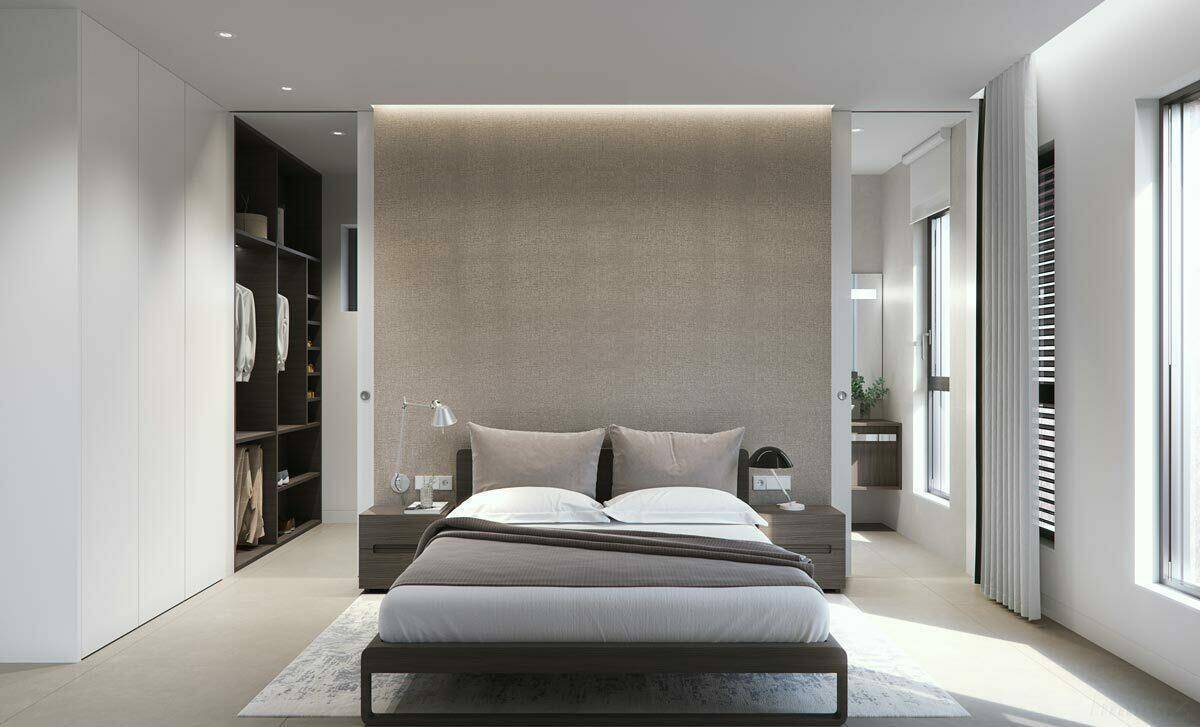 Elegantes Schlafzimmer mit integriertem begehbarem Kleiderschrank und modernen Einbauschränken.
