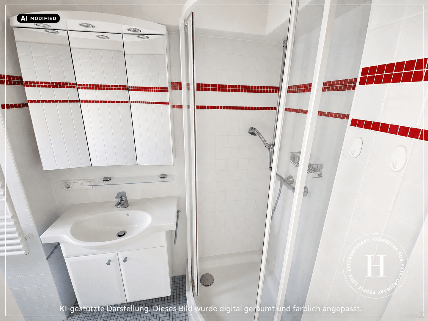 Modernes Badezimmer mit Dusche, weißem Waschtisch und roten Akzentfliesen.
