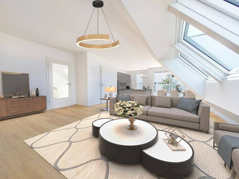 Helles Wohnzimmer mit Dachschrägen, großen Dachfenstern und modernem Interieur.