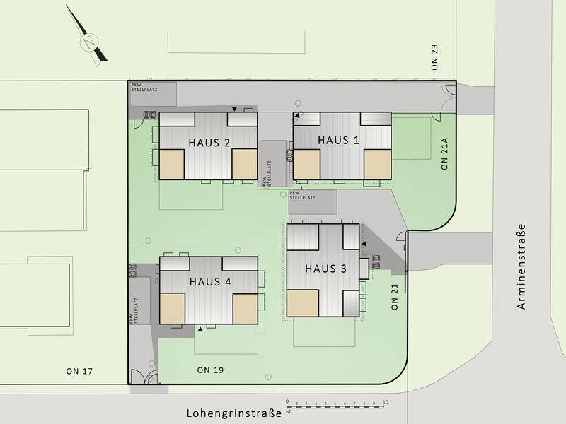 Übersichtsplan der Wohnanlage mit vier Häusern, Straßen und Stellplätzen.