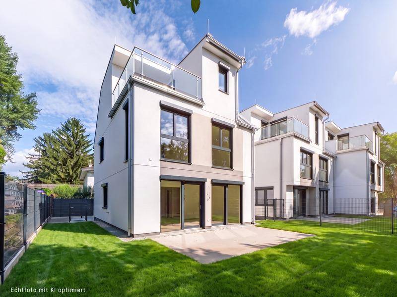 Moderne Neubau-Doppelhaushälfte mit Garten und Terrasse in sonniger Lage.