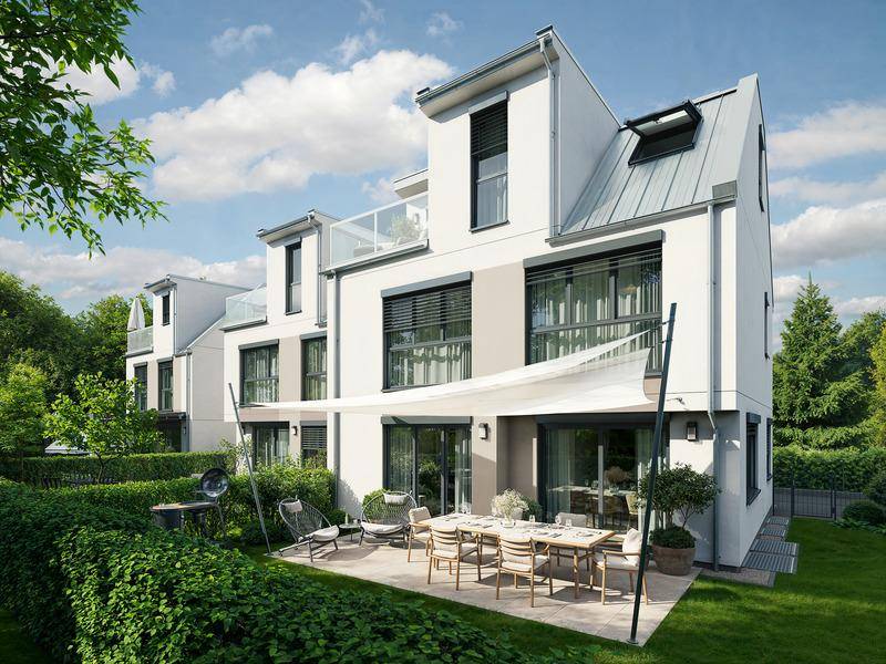 Moderne Reihenhäuser mit großzügiger Terrasse, Garten und Außenbereich für Mahlzeiten.