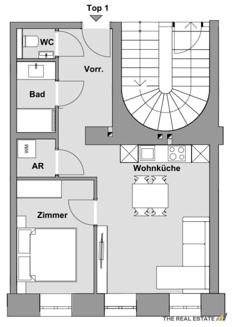 Grundriss einer Duplex-Wohnung mit offener Wohnküche, Schlafzimmer, Bad und internem Treppenaufgang.