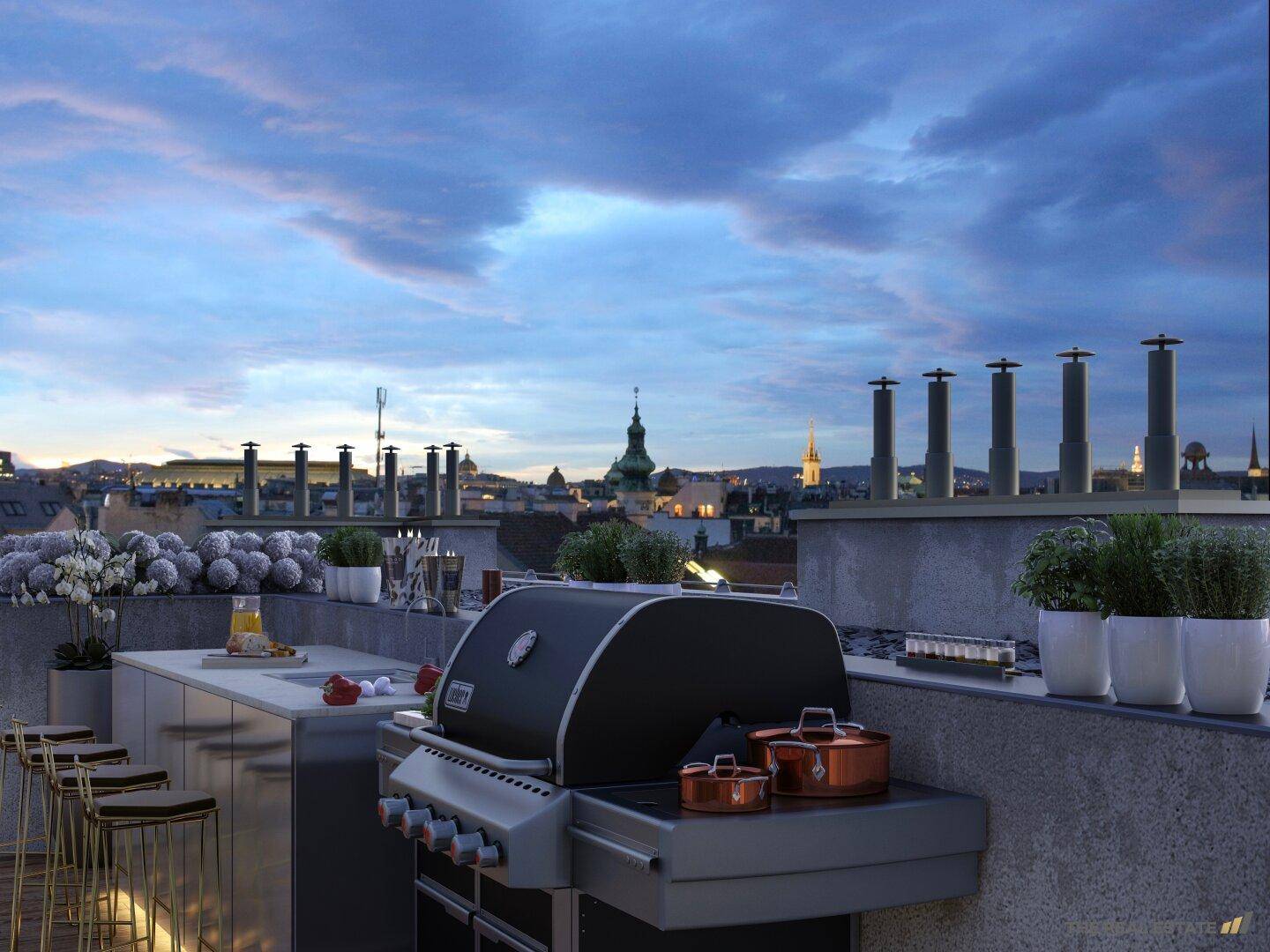 Dachterrasse mit moderner Außenküche, Grillbereich und Panoramablick über die Dächer der Stadt.