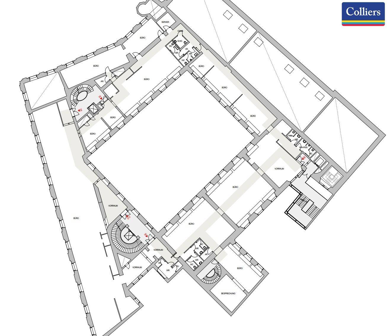 Detaillierter Grundriss eines großen Gebäudes mit mehreren Büroräumen, Treppenhäusern und Aufzügen.