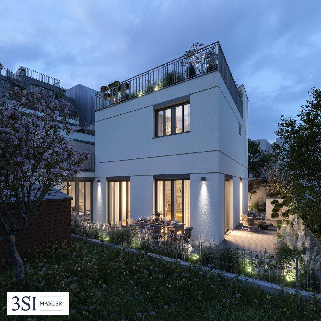 Beleuchtete moderne Reihenhäuser mit privaten Gärten und Terrassen am Abend.