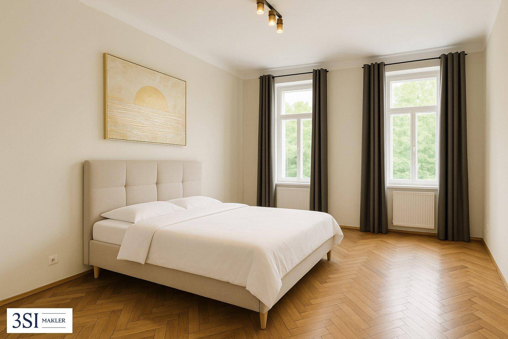 Gemütliches Schlafzimmer mit Fischgrätparkett, Doppelbett und zwei großen Fenstern.