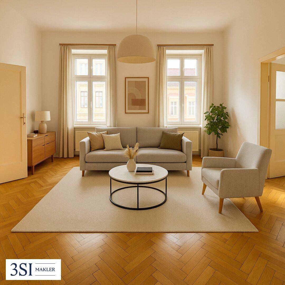 Klassisches Wohnzimmer mit Fischgrätparkett, beigem Sofa und großen Fenstern.