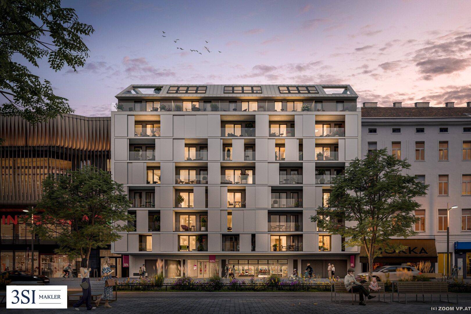 Moderne Wohnhausfassade bei Sonnenuntergang mit beleuchteten Fenstern und Balkonen.