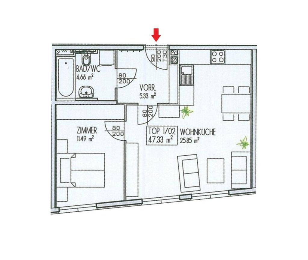 Grundrissplan der Wohnung mit Wohnküche, Schlafzimmer und Badezimmer.