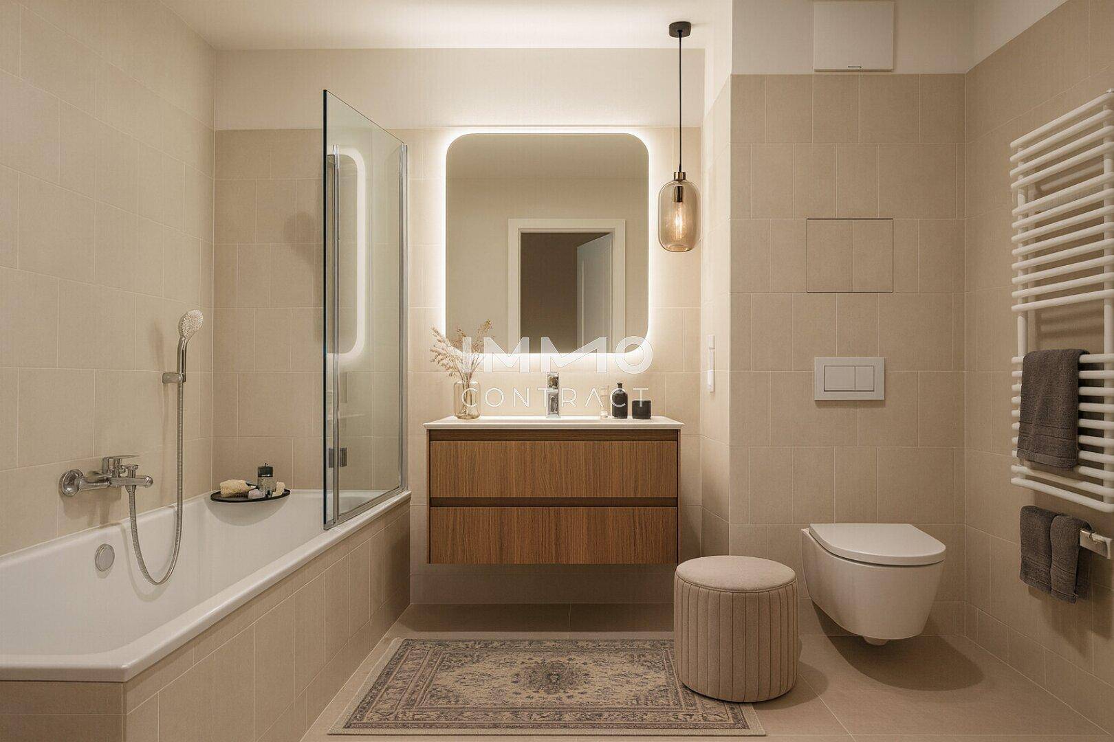 Modernes Badezimmer mit Badewanne, Duschabtrennung, wandhängendem WC und beheiztem Handtuchhalter.