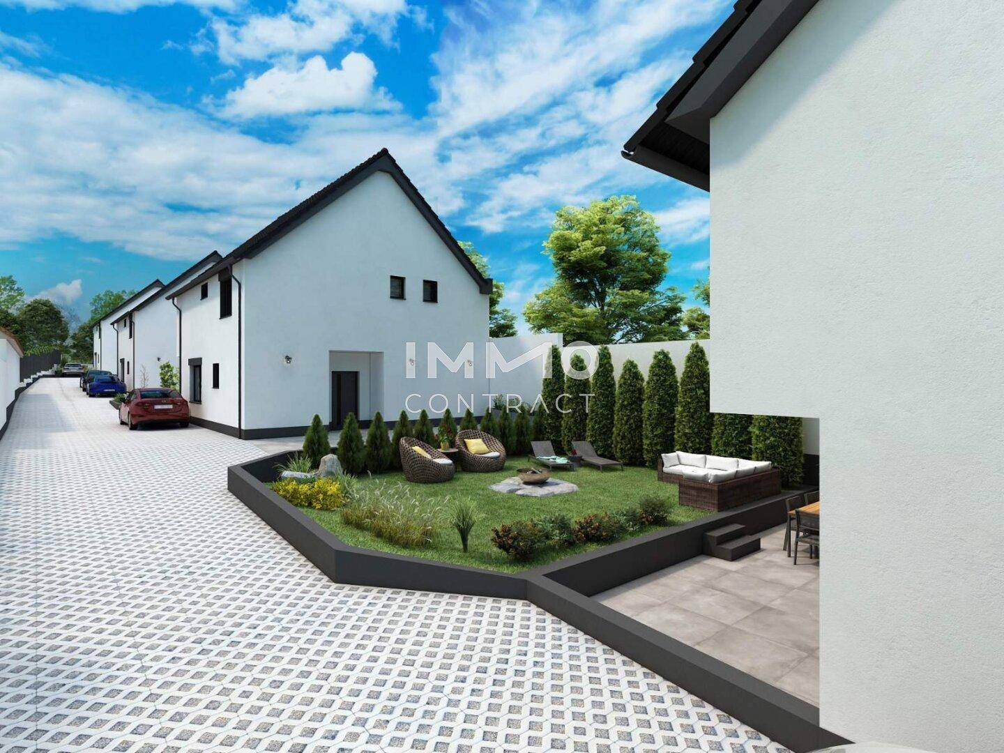 Reihenhäuser mit modernen Gärten, Terrassen und gepflasterten Wegen.
