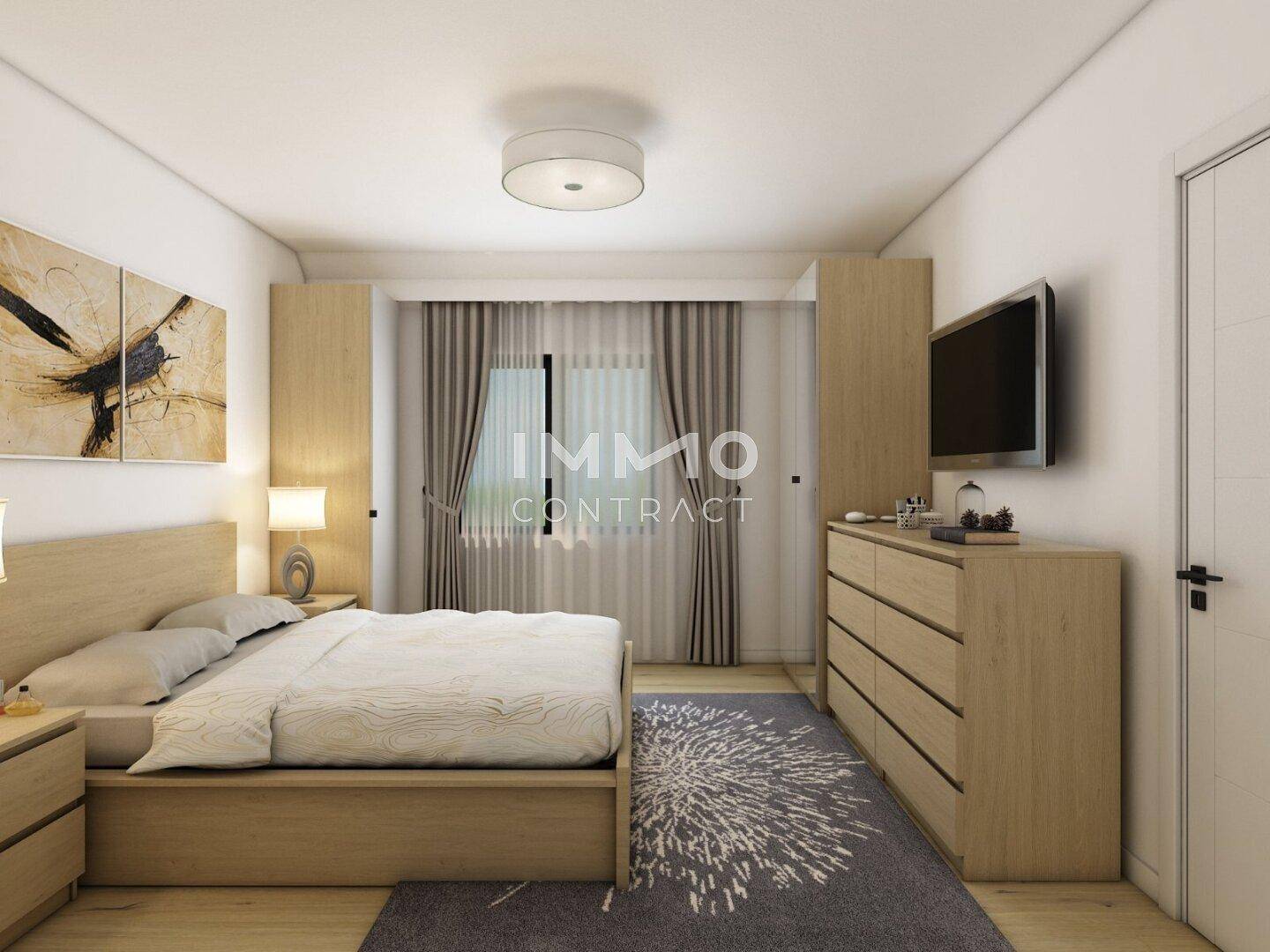Modernes Schlafzimmer mit Holzboden, großem Bett und integrierten Schränken.