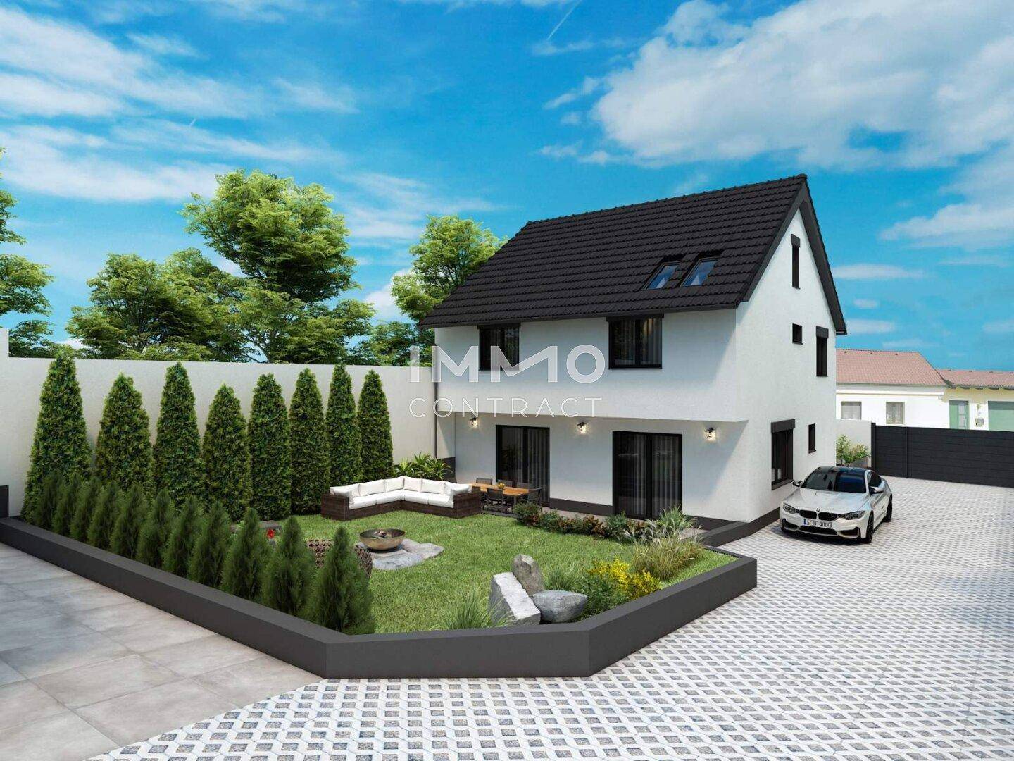Modernes Einfamilienhaus mit gepflegtem Garten, Terrasse und Auffahrt.