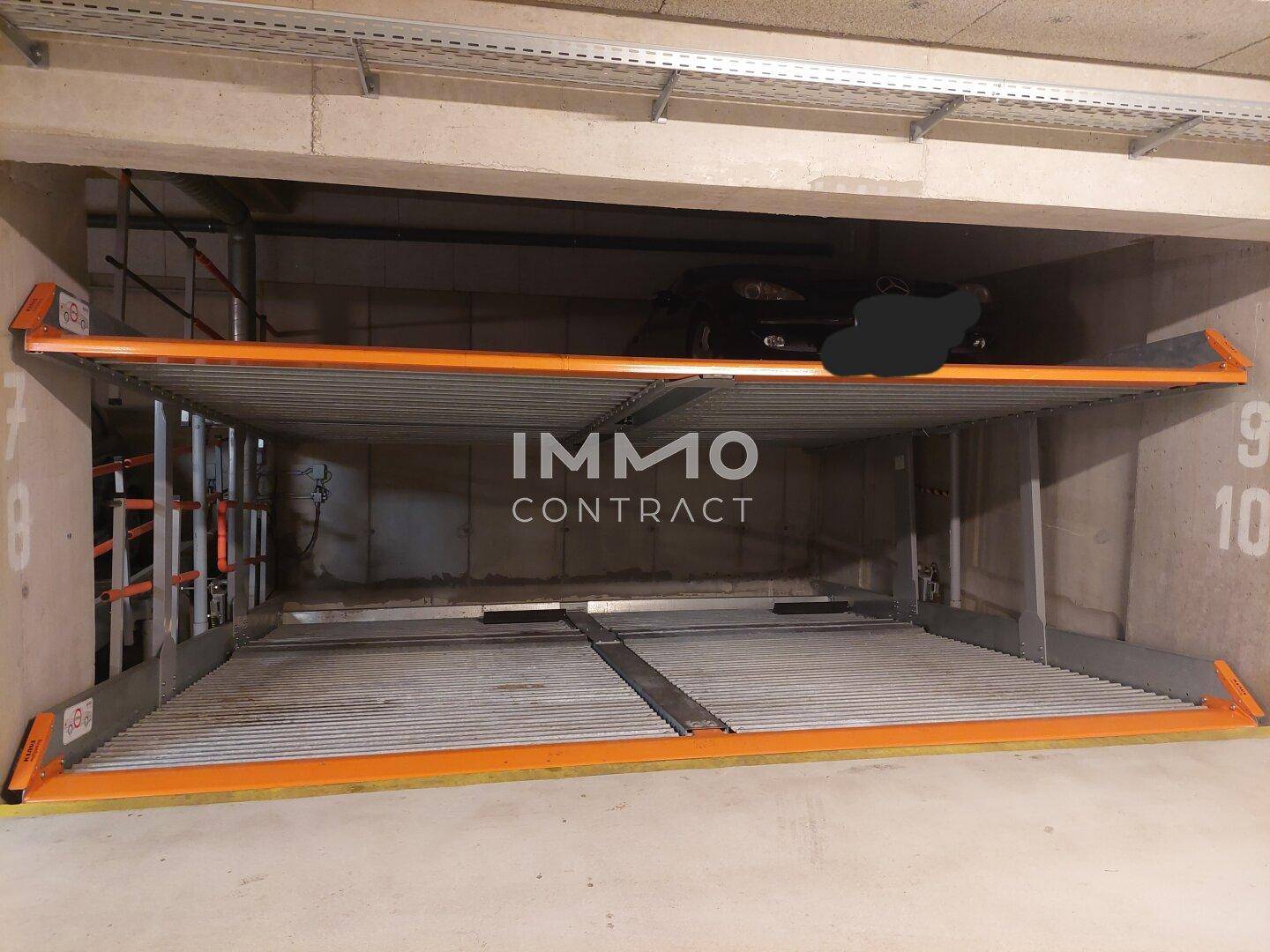 Doppelparker-System in der Tiefgarage für effiziente Raumnutzung.