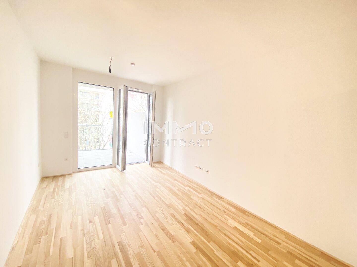 Wohnzimmer mit Balkon