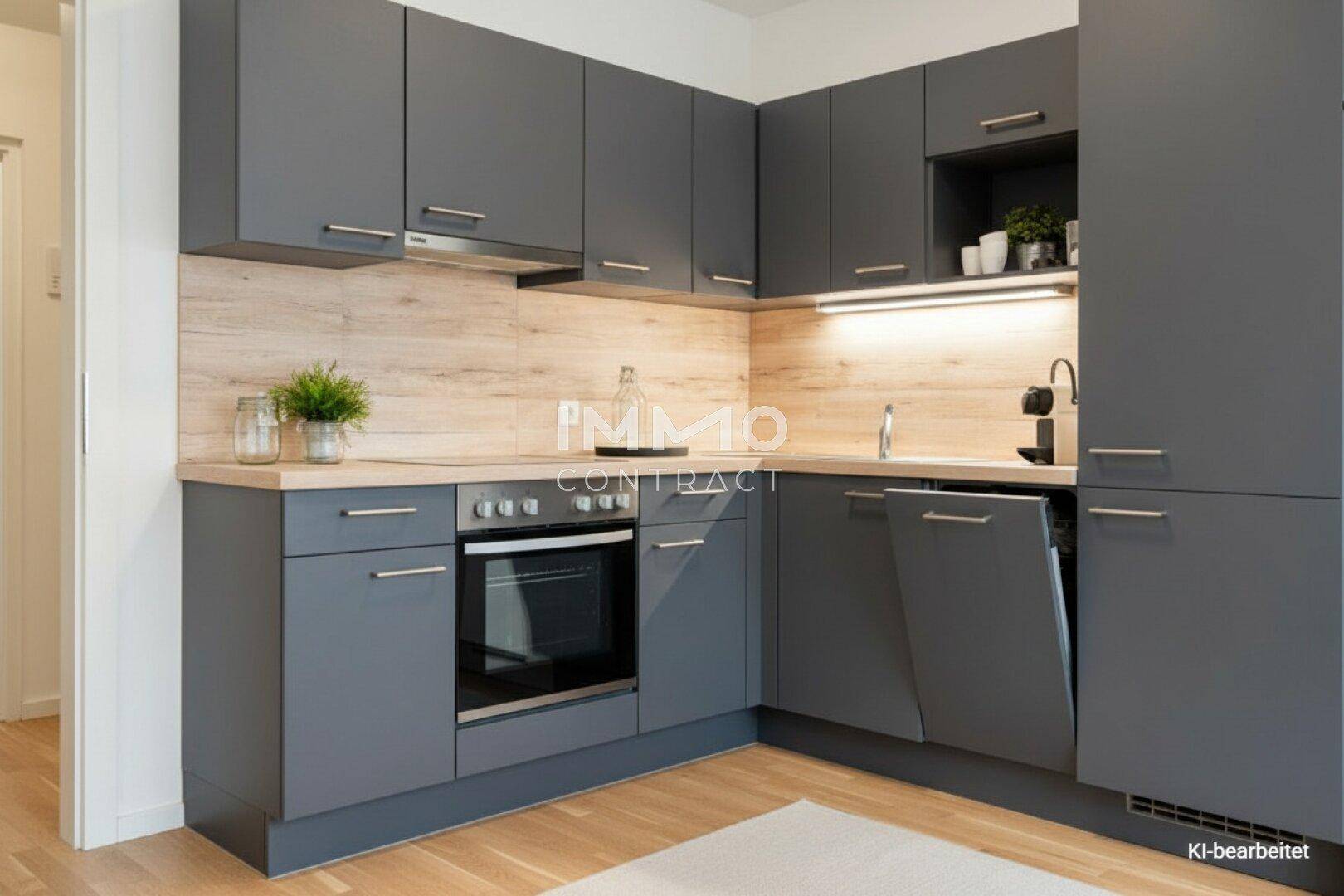 Moderne Einbauküche in Grau mit Holzoptik-Arbeitsplatte und integrierten Geräten.