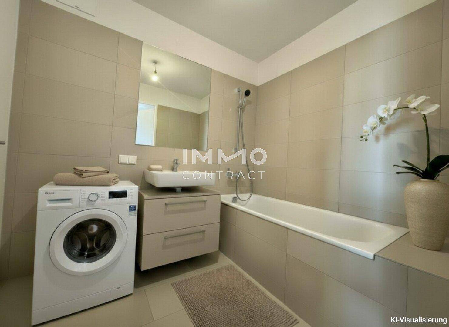 Modernes Badezimmer mit Badewanne, Waschbecken und Waschmaschine in hellen Fliesen.