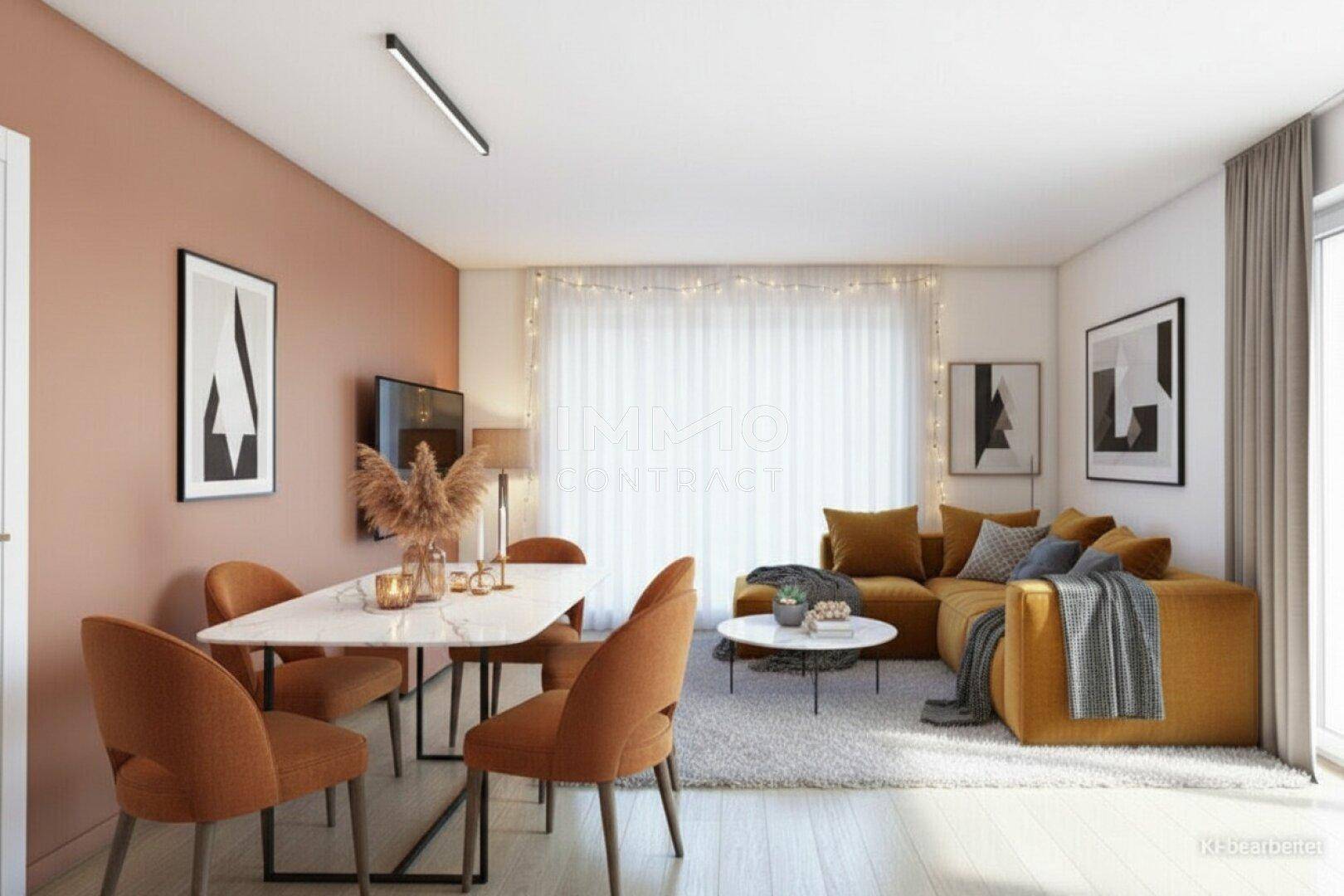 Gemütlicher offener Wohn-Essbereich mit modernem Sofa, Esstisch und warmen Farbakzenten.