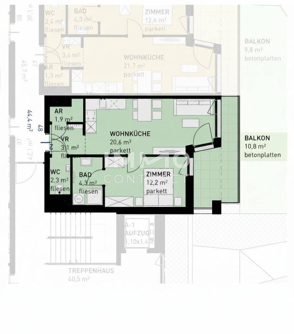 Grundriss einer Wohnung mit Wohnküche, Zimmer, Bad, WC und großem Balkon.
