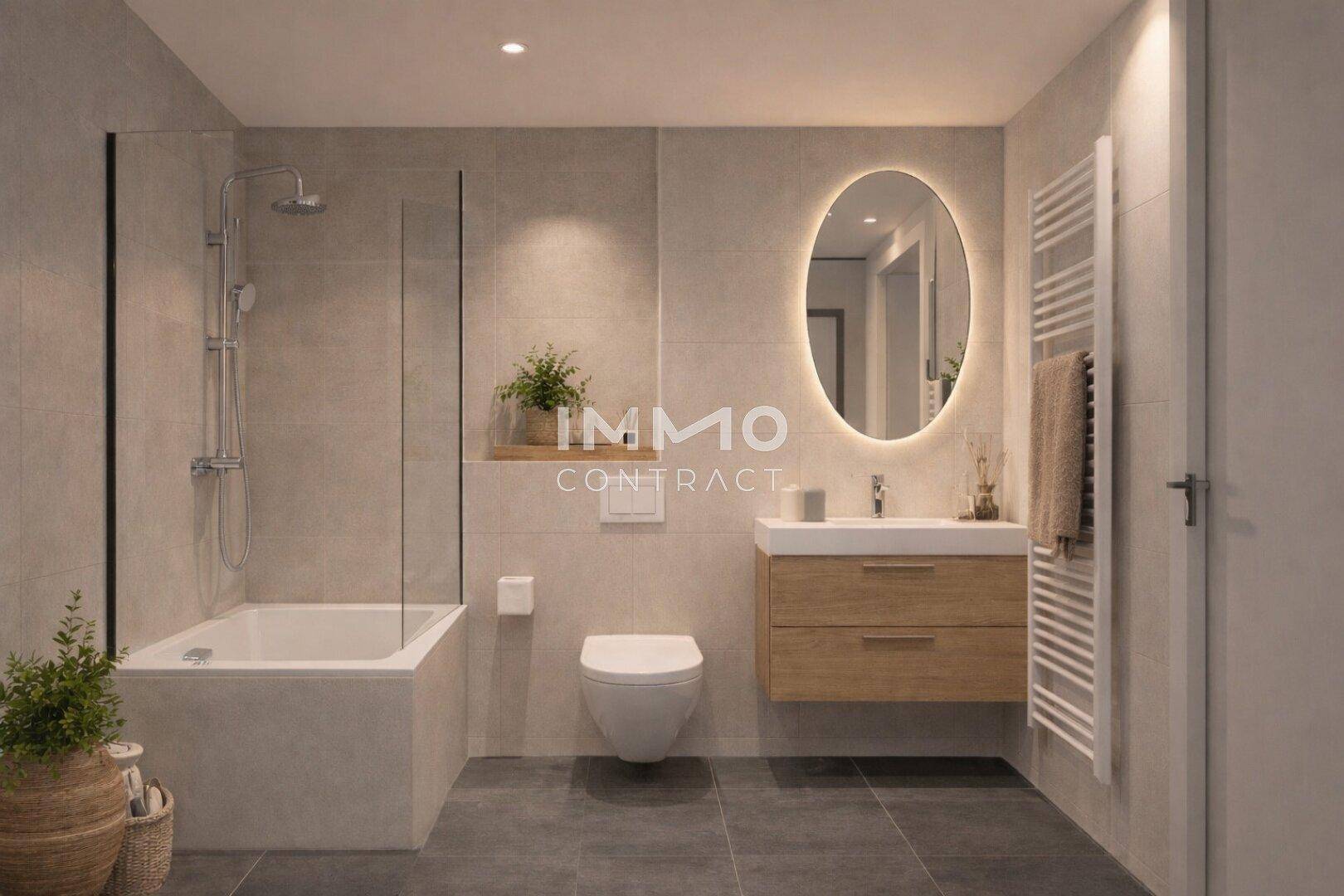 Modernes Badezimmer mit Badewanne, Dusche, schwebendem Waschtisch und beleuchtetem Spiegel.