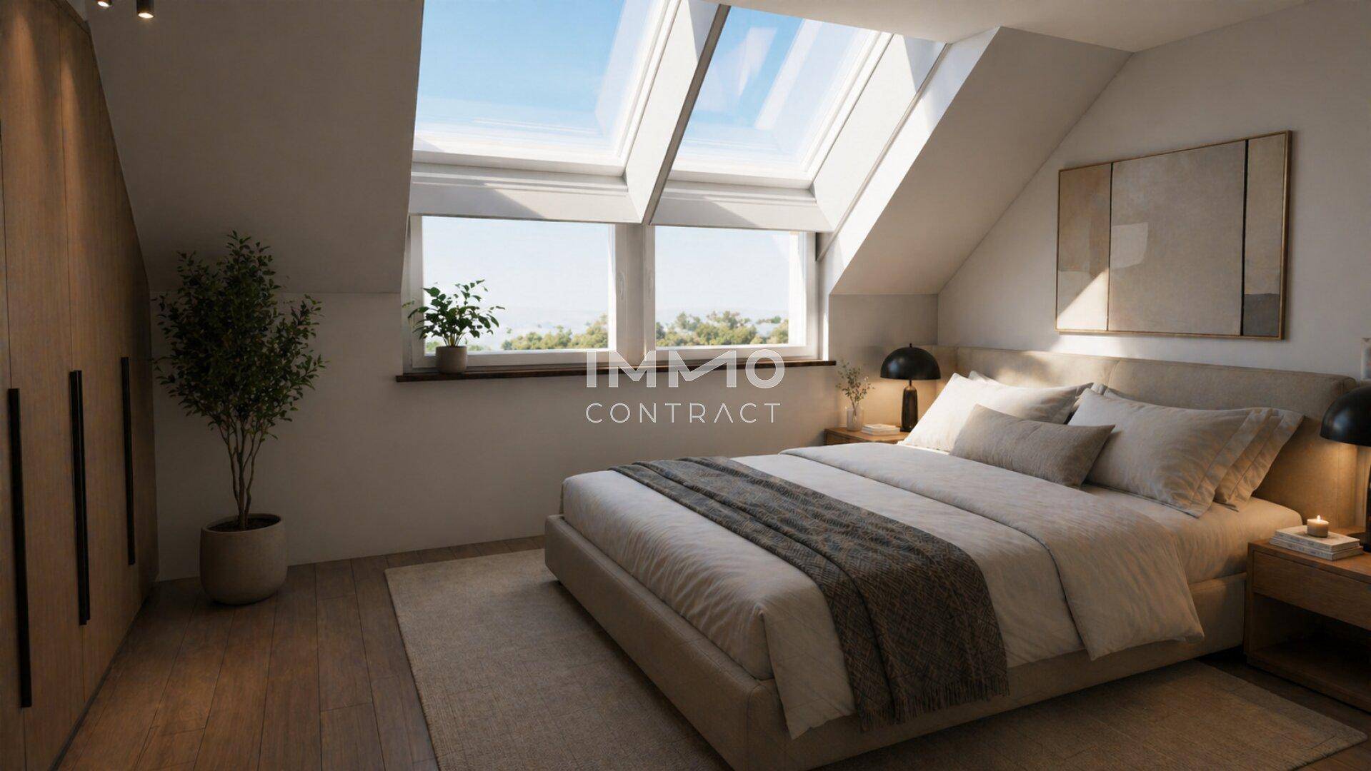 Gemütliches Schlafzimmer im Dachgeschoss mit großen Dachfenstern, Holzboden und schrägen Wänden.