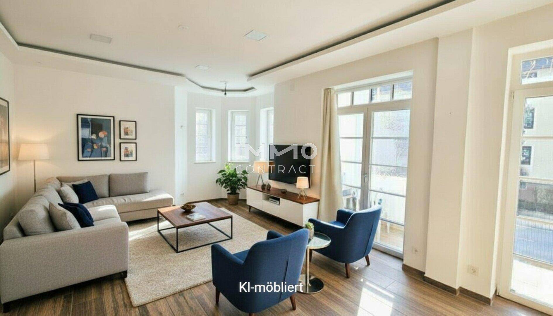 Gemütliches Wohnzimmer mit modernen Möbeln, Holzboden und Zugang zu einem Außenbereich.