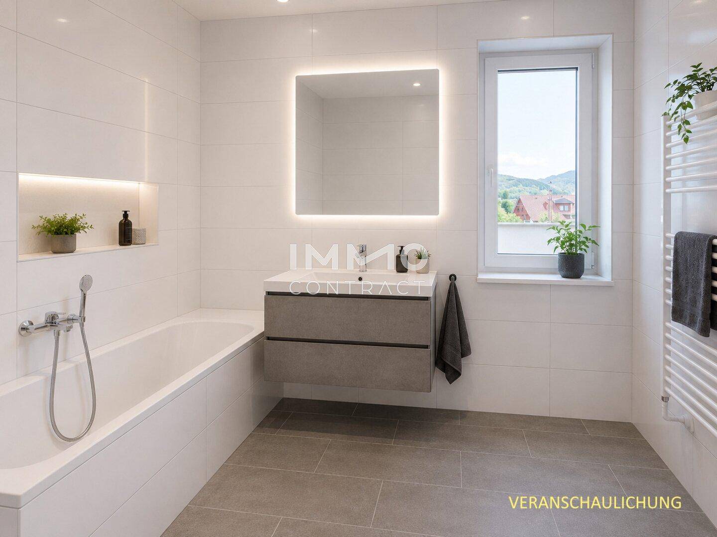 Modernes Badezimmer mit Badewanne, schwebendem Waschtisch und beleuchtetem Spiegel.