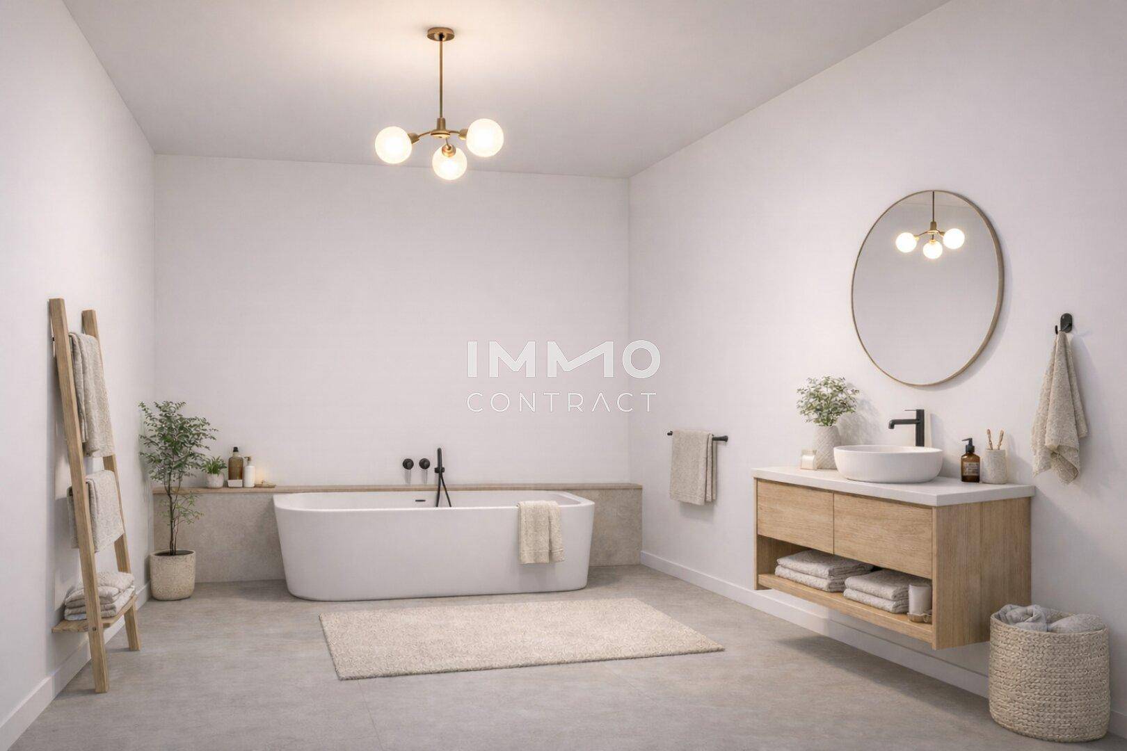 Modernes Badezimmer mit freistehender Badewanne und elegantem Waschtisch.