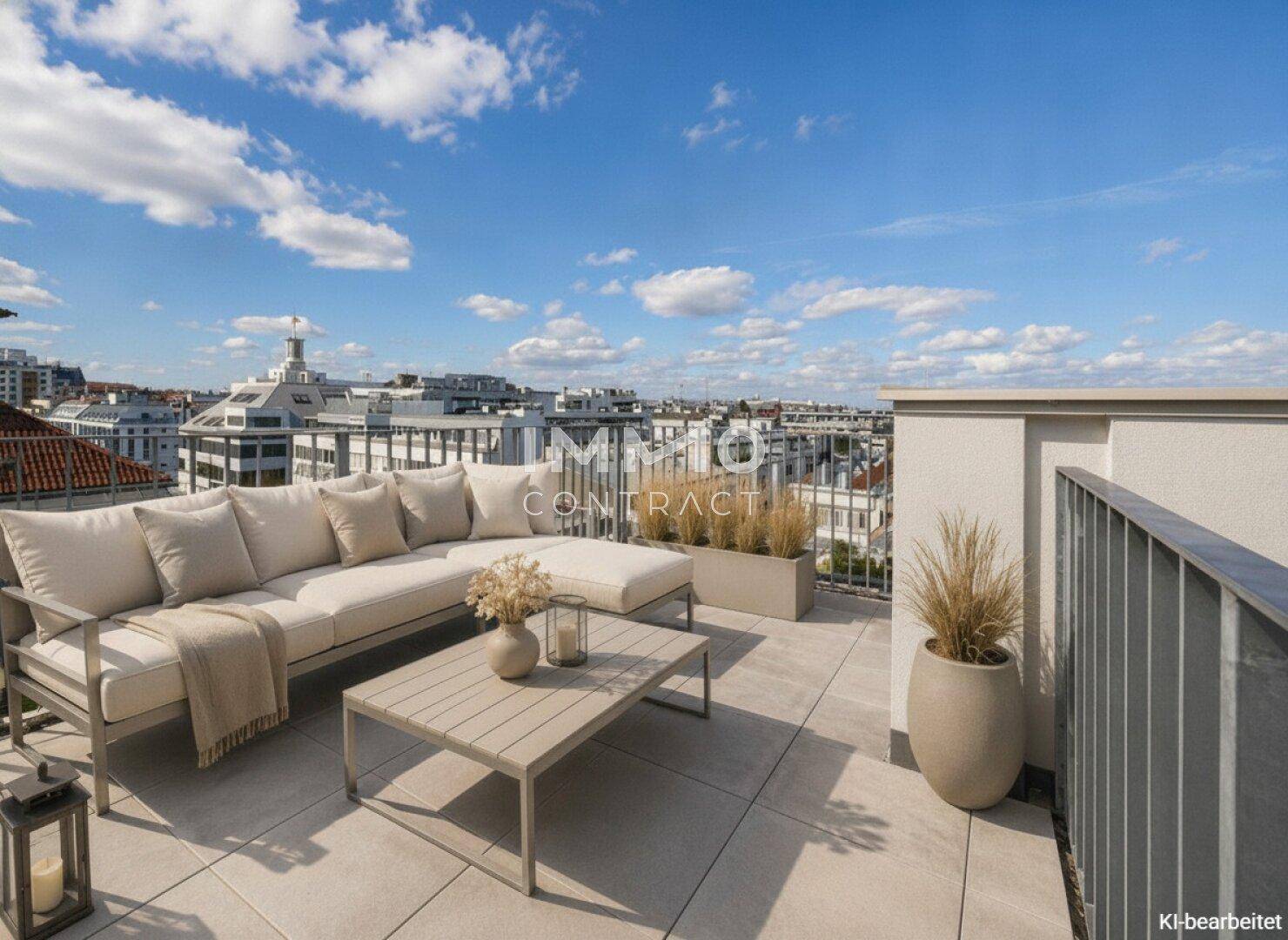 Großzügige Dachterrasse mit bequemen Loungemöbeln und weitem Blick über die Stadt.