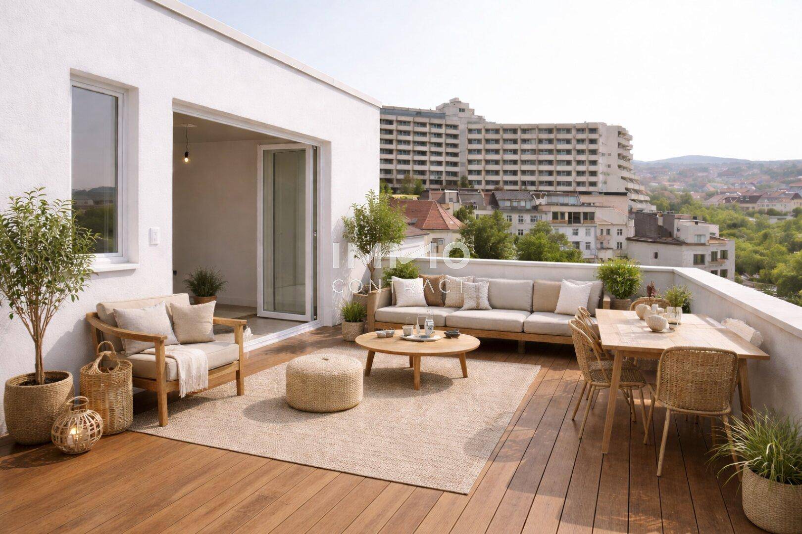 Geräumige Dachterrasse mit bequemen Gartenmöbeln und weitem Blick über die Stadt.