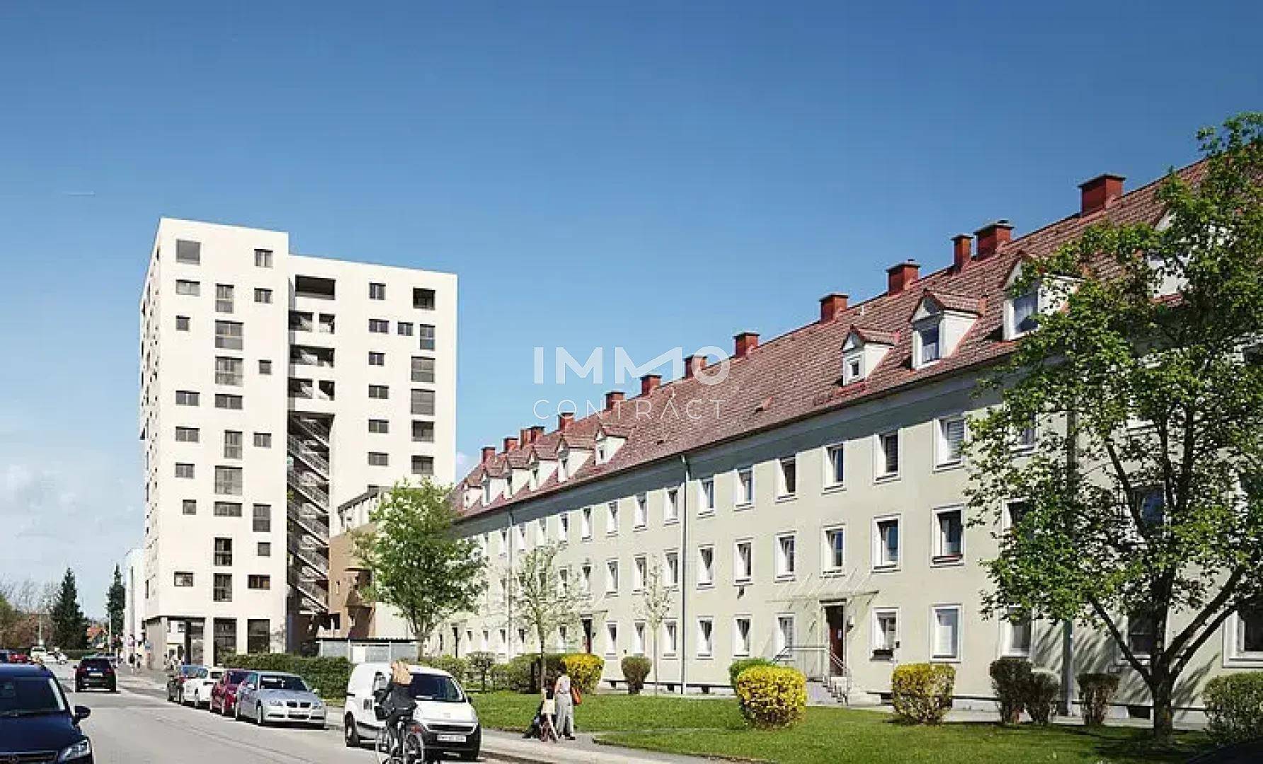 Ansicht zweier Wohngebäude in einer städtischen Umgebung, mit einem modernen Hochhaus und einem traditionellen Gebäude mit Satteldach.