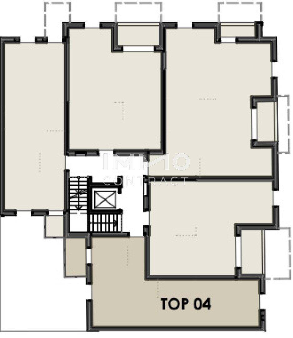 Grundriss mit mehreren Räumen, Treppenhaus und Aufzug, möglicherweise eine Etage des Gebäudes.