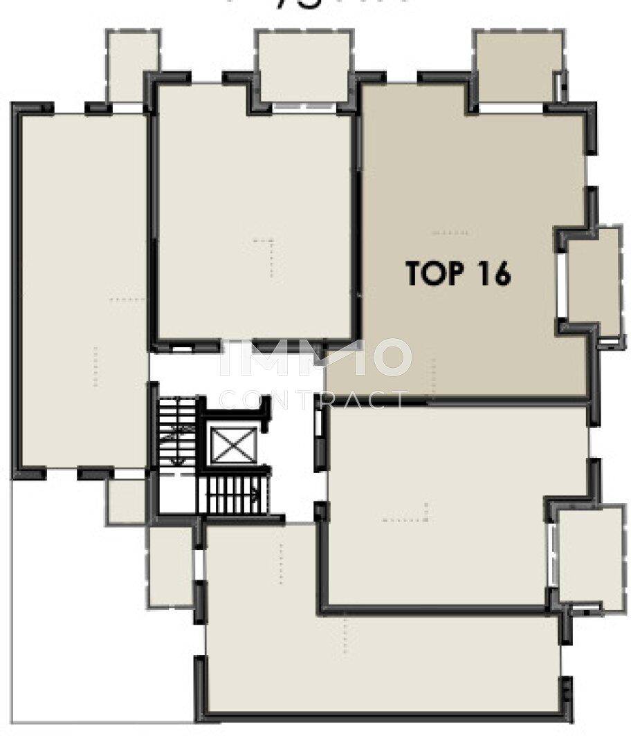 Grundriss einer Etage mit mehreren Wohneinheiten und einem zentralen Treppenhaus mit Aufzug.