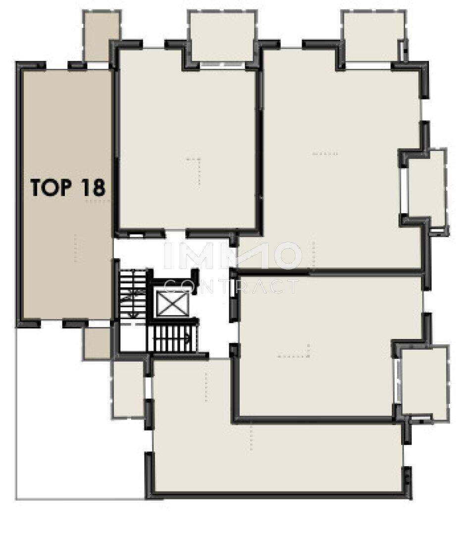 Grundriss einer Etage mit mehreren Wohneinheiten und zentralem Treppenhaus.
