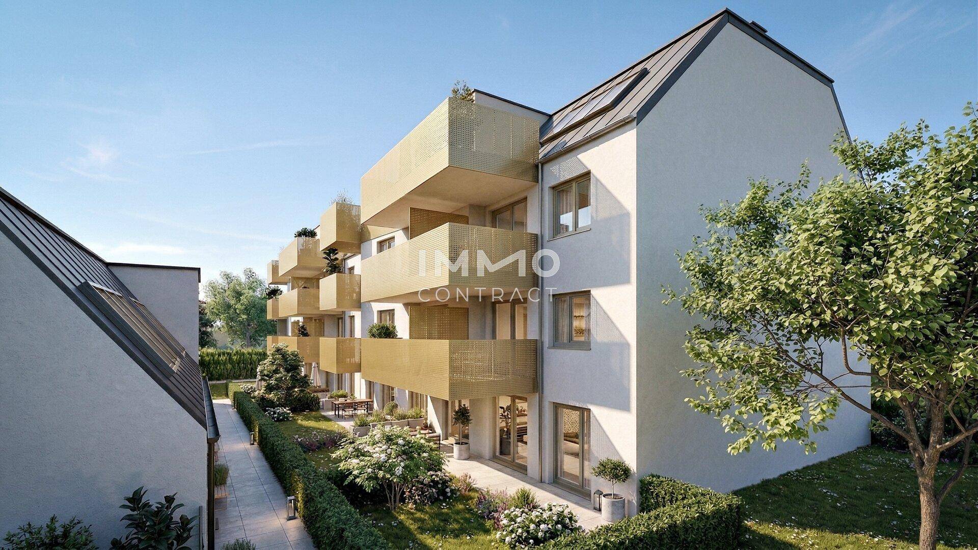 Moderne Wohnanlage bei Tageslicht mit großzügigen Balkonen und gepflegten Außenbereichen.