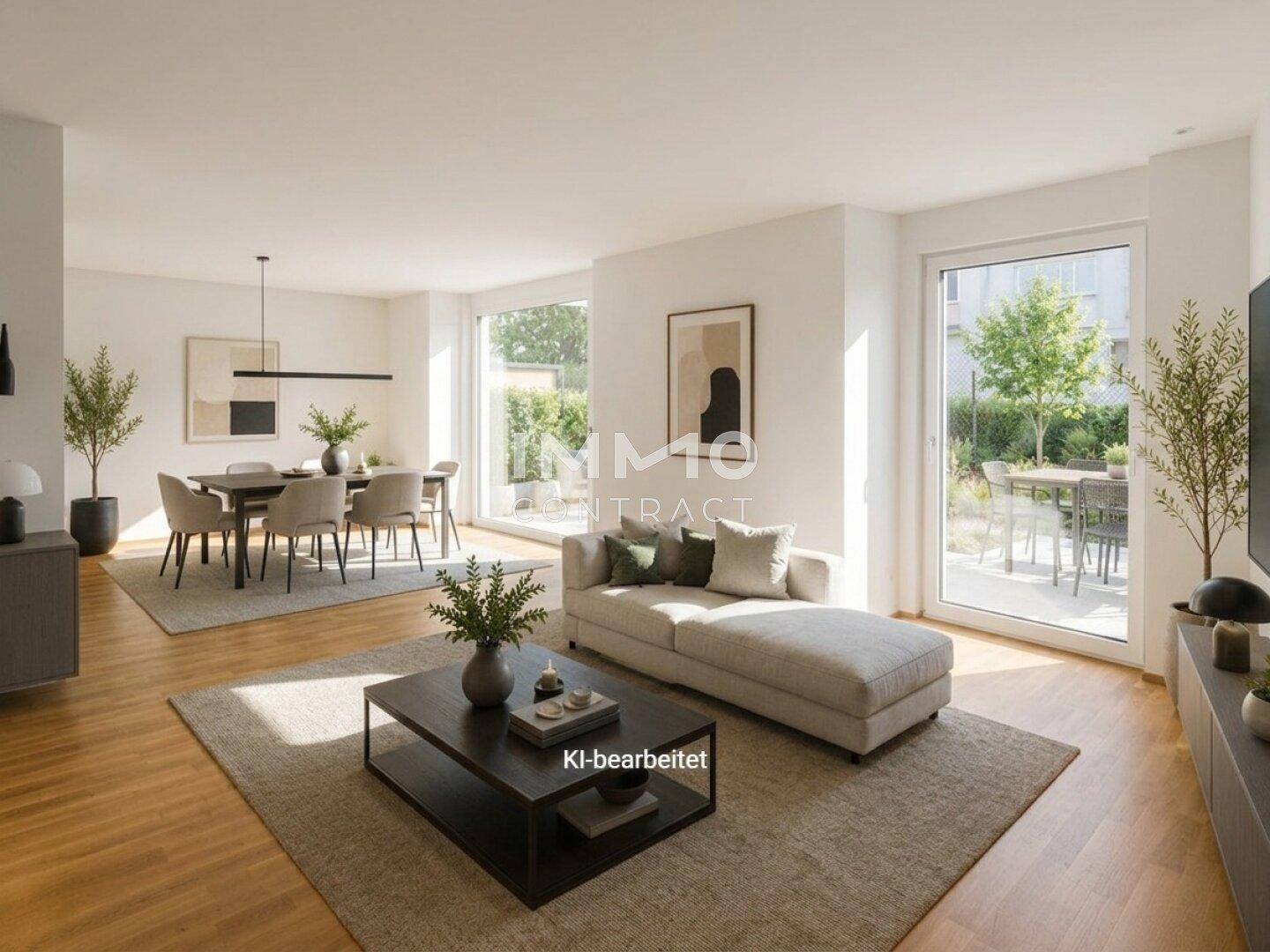 Helles, offenes Wohn- und Esszimmer mit Holzboden, modernen Möbeln und Zugang zur Terrasse.