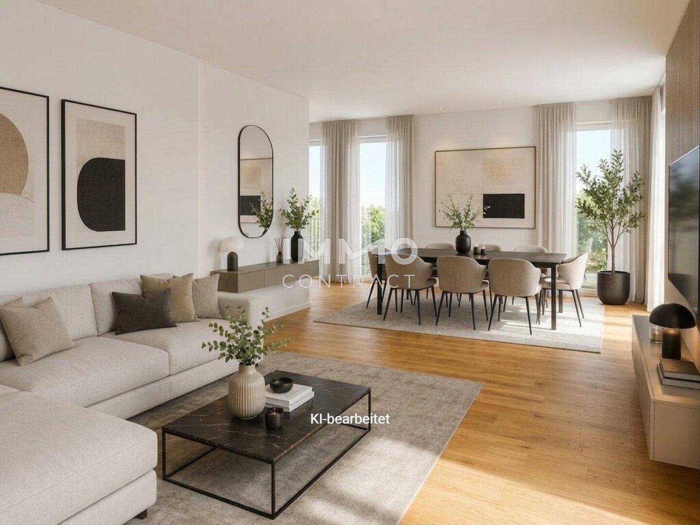 Stilvoller Wohn- und Essbereich mit Holzboden, bequemer Couch und elegantem Esstisch.
