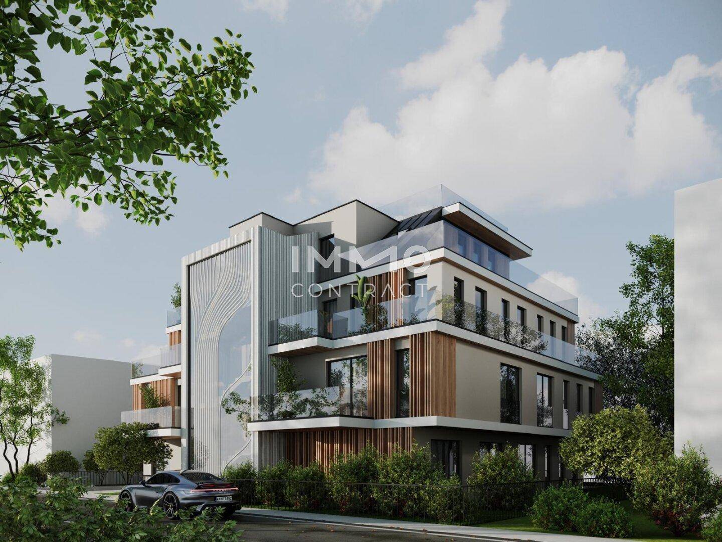 Zeitgenössisches Gebäude mit markanter Fassade, Balkonen und integrierter Tiefgarage.