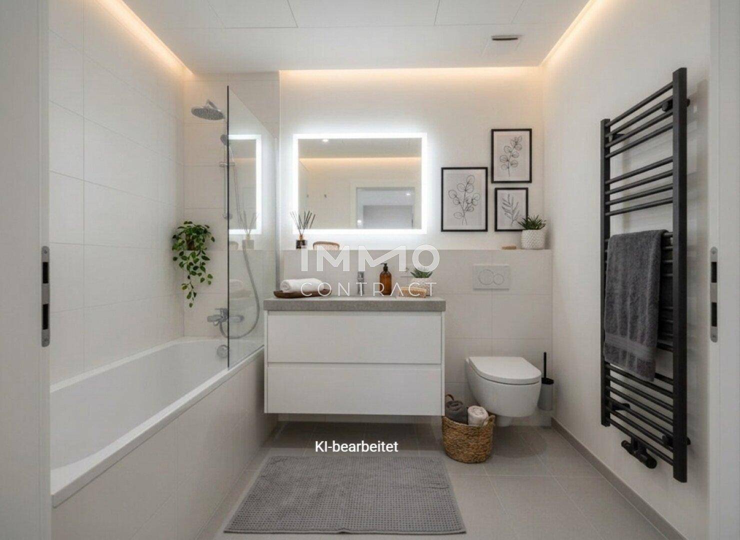 Modernes Badezimmer mit Badewanne, Duschbereich, beleuchtetem Spiegel und Handtuchheizkörper.