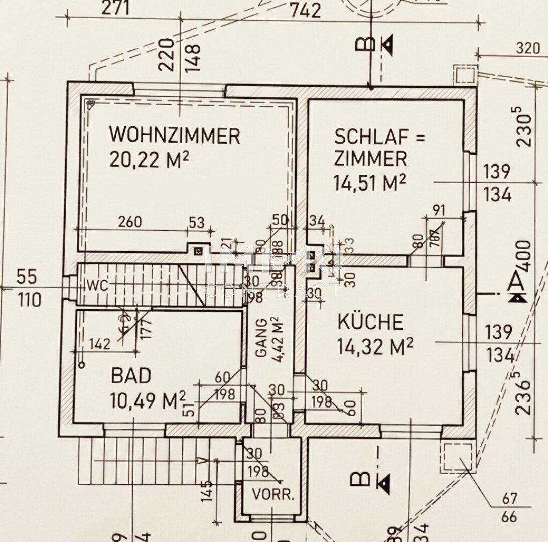Grundriss des Erdgeschosses mit Wohnzimmer, Schlafzimmer, Küche und Bad.