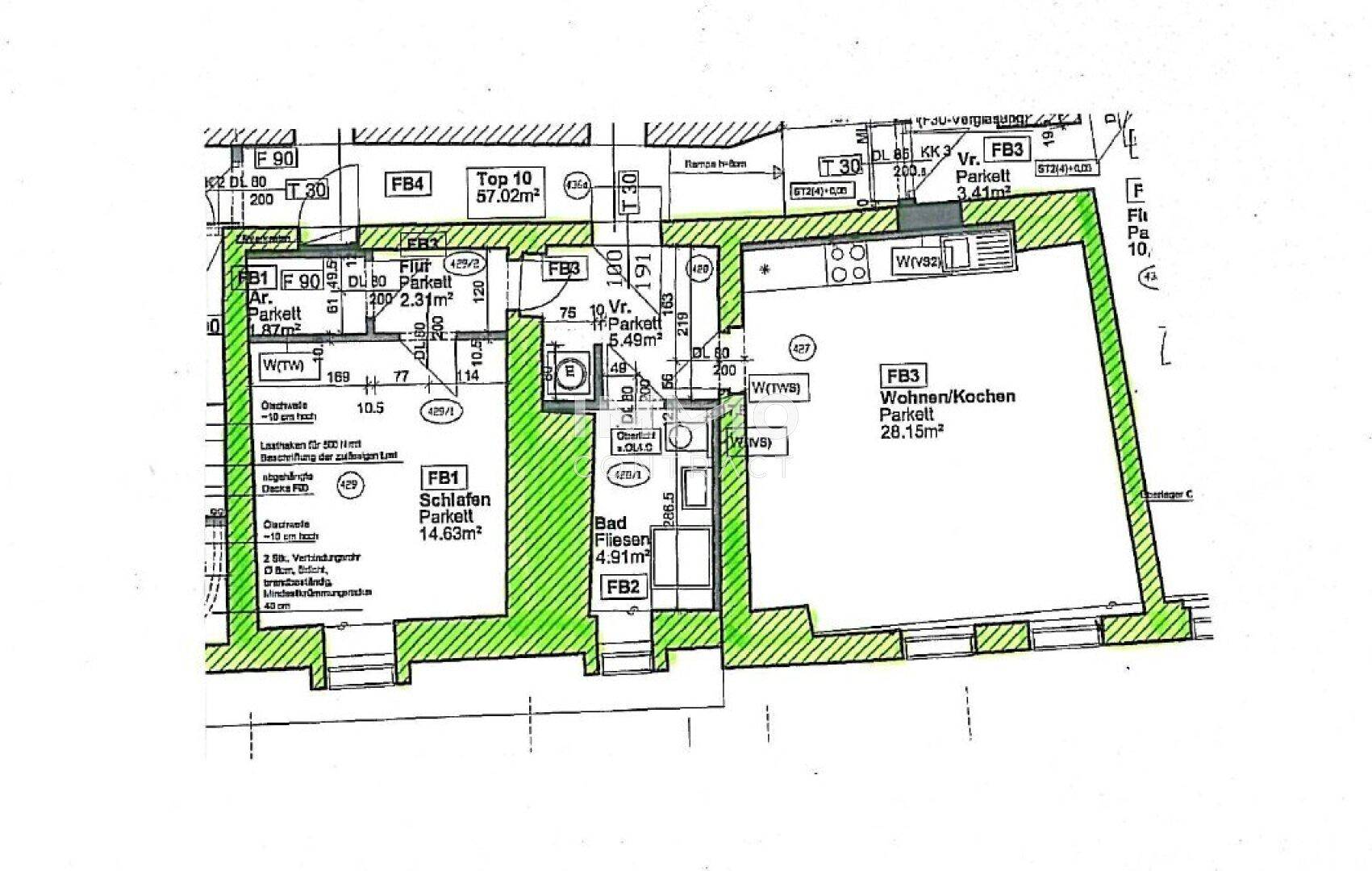 Detaillierter Grundriss einer Wohnung mit Wohn-/Kochbereich, Schlafzimmer und Badezimmer.