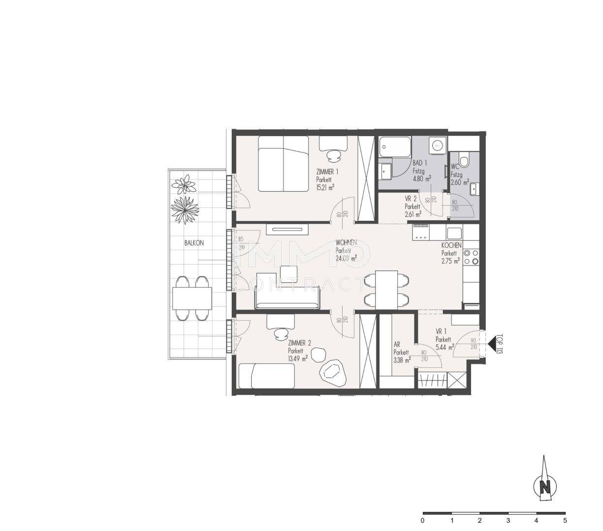 Grundriss einer Wohnung mit zwei Schlafzimmern, Balkon und offenem Wohnbereich.