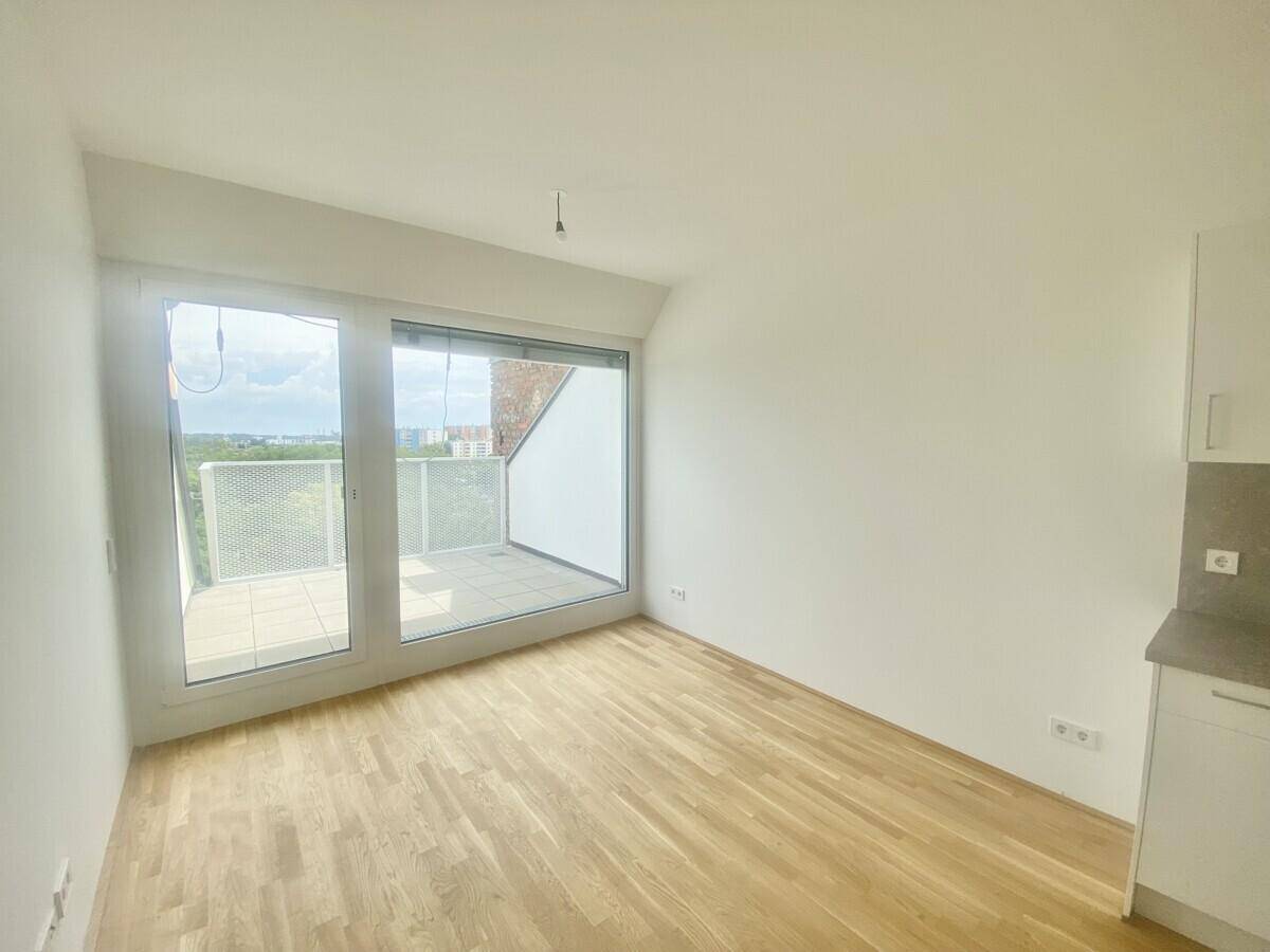 Wohnesszimmer mit Balkon