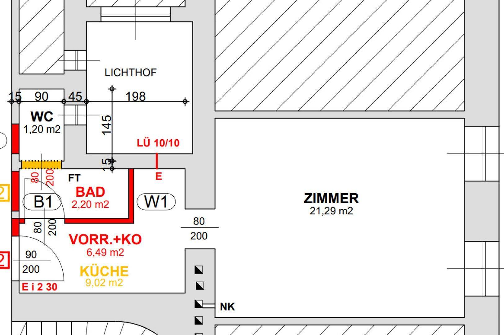Grundriss zeigt eine funktionale Aufteilung mit separatem WC, Bad, Küche und einem geräumigen Zimmer, ergänzt durch einen Lichthof.