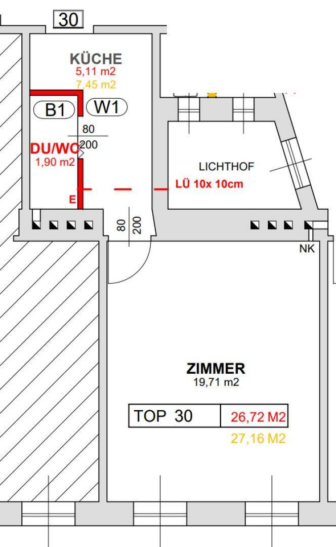 Grundriss zeigt die Aufteilung einer Wohnung mit Küche, Bad und einem Zimmer.