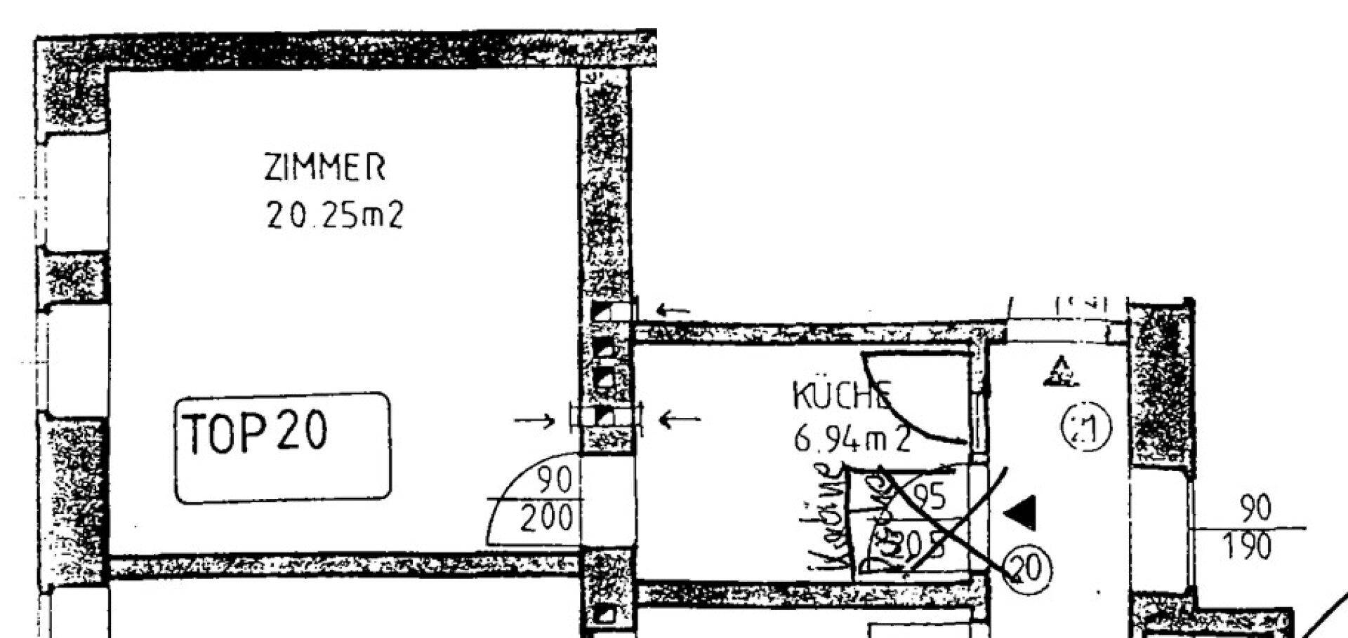 Schwarz-weißer Grundriss zeigt die Aufteilung eines Zimmers und einer Küche mit Flächenangaben.
